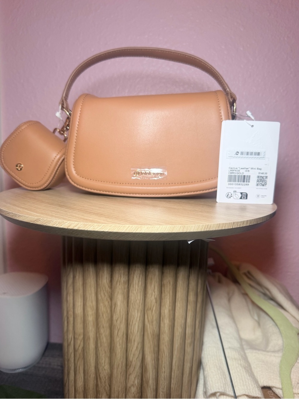Lululemon genuineLeather cross body Mini Bag in camel